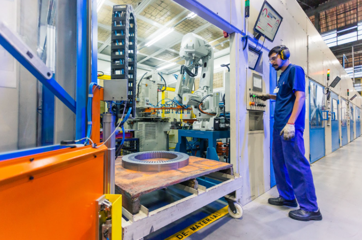 Man testing the automation device for an electric motor.