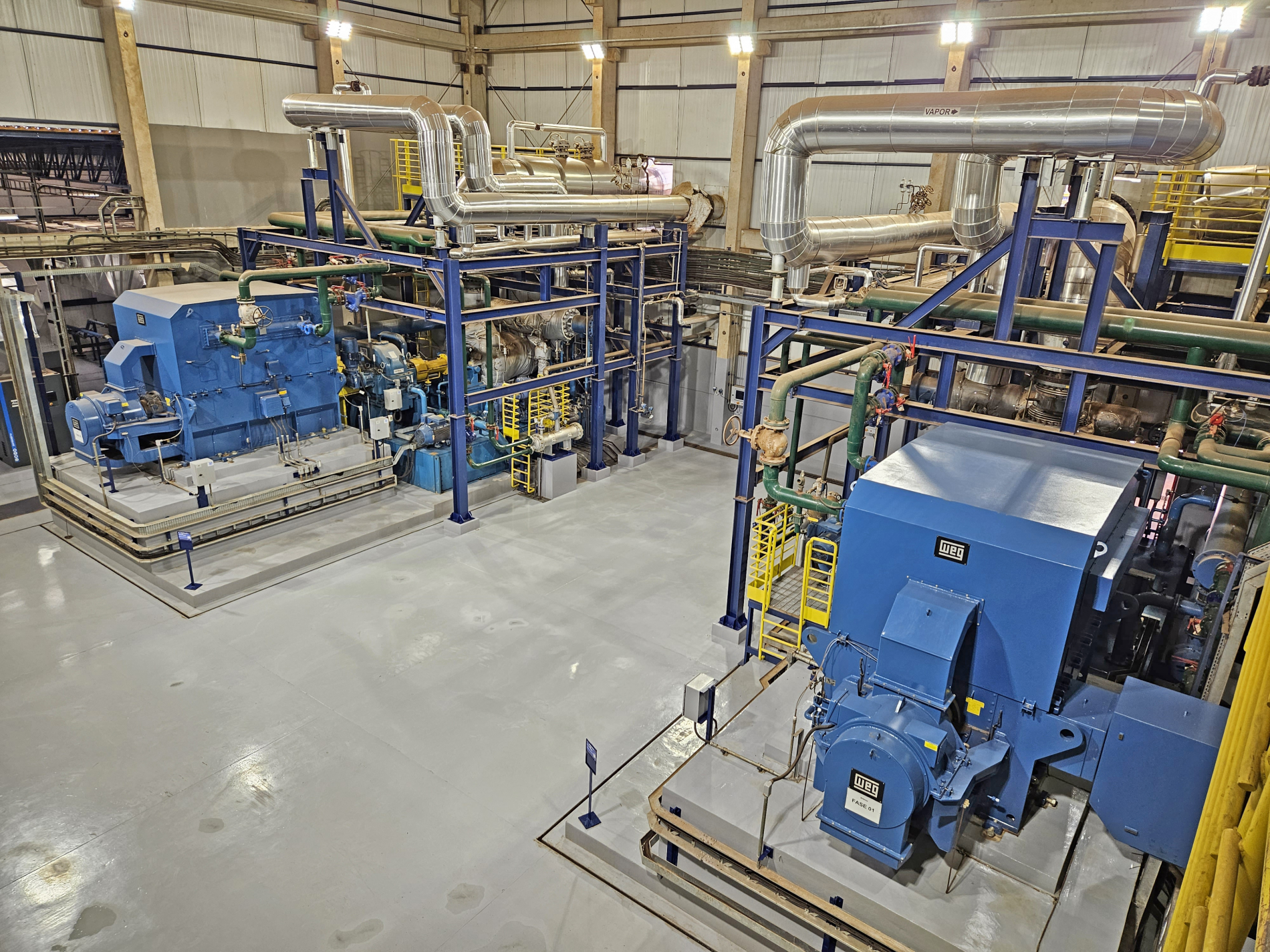 Industrial power generation facility showcasing WEG turbine generators and interconnected systems for optimized industrial automation performance.