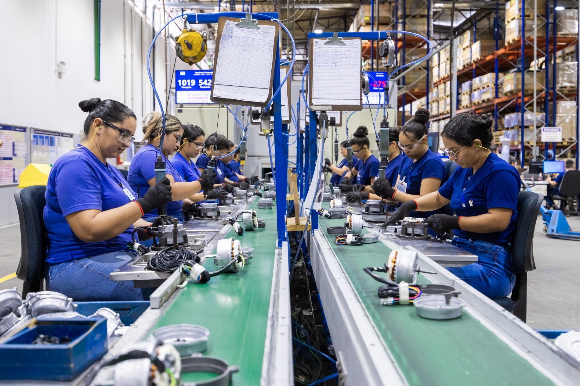 OEM technicians assemble plug-and-play electric motors on a production line, ensuring seamless and consistent integration.